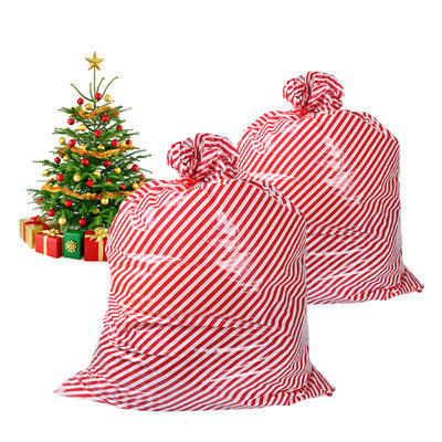 kualitas  36x56inch 30 Microns Custom Plastic Gift Bags Christmas Present pabrik